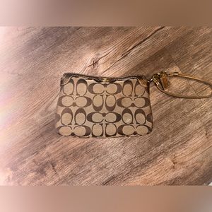 Coach gold and tan wristlet
